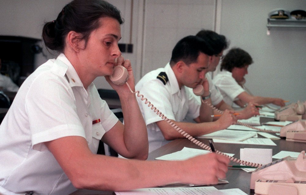18 May 1987: US Navy personnel take calls at the Emergency Coordination Center.
