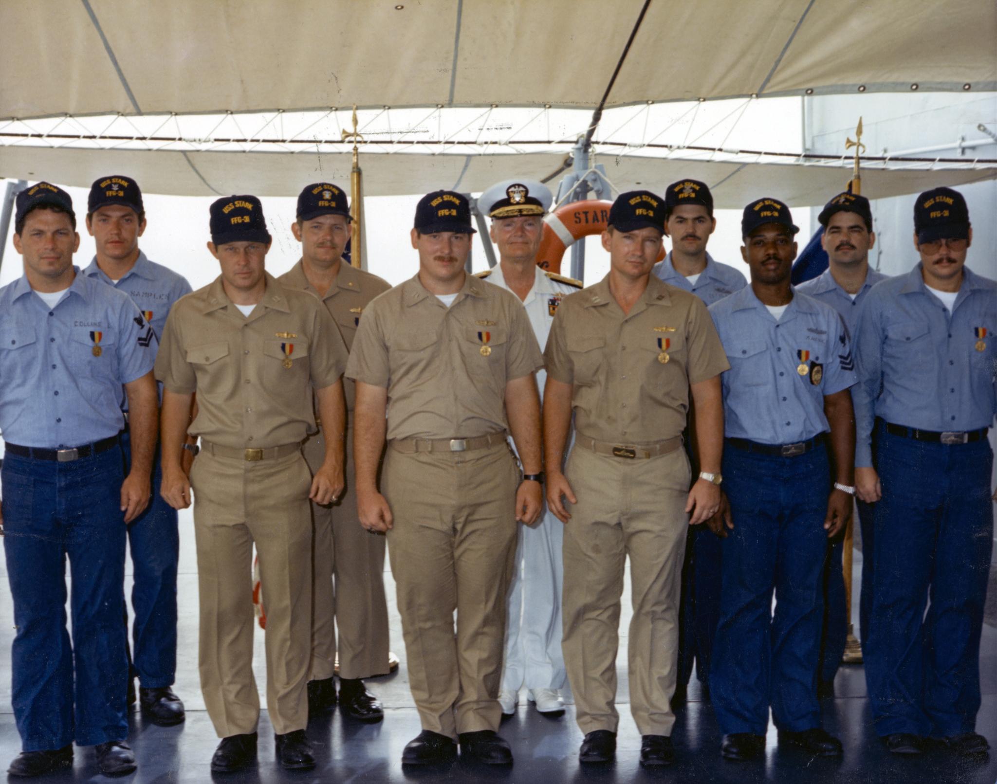 10 August 1987: Crew members receiving the Navy and Marine Corps Medal for their actions aboard the USS Stark.  The NMCM is the 
                            highest non-combat decoration for heroism by the United States Department of the Navy.