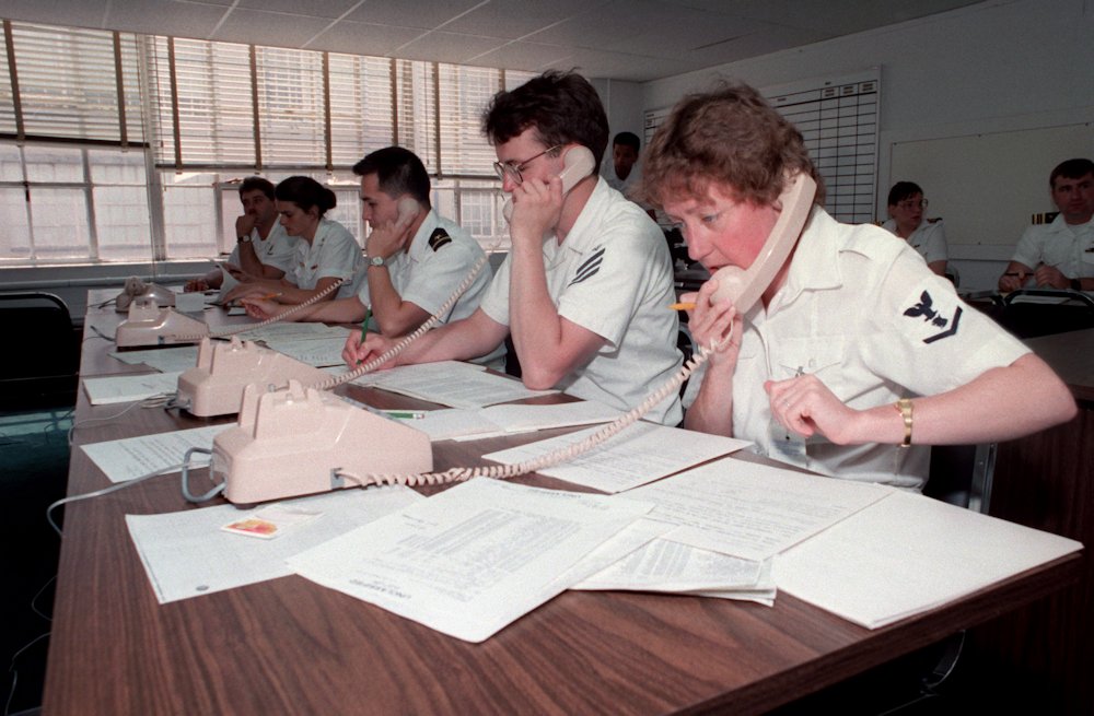 May 17, 1987: US Navy personnel take calls at the Emergency Coordination Center regarding the Stark attack.