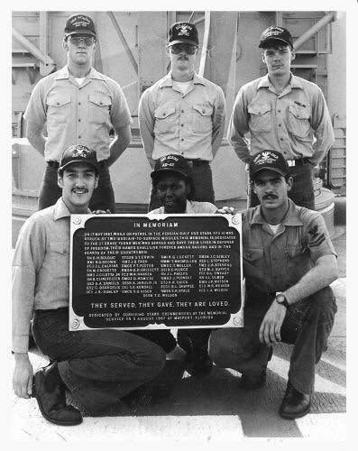 Memorial plaque created by shipmates of the USS Acadia AD-42.<br>Top Row: Mike Butler, 
		    Mark Debolt, Gary Hanline<br>Bottom Row: Geraldo Soto, Shirley Foster, Bob Bovaconti